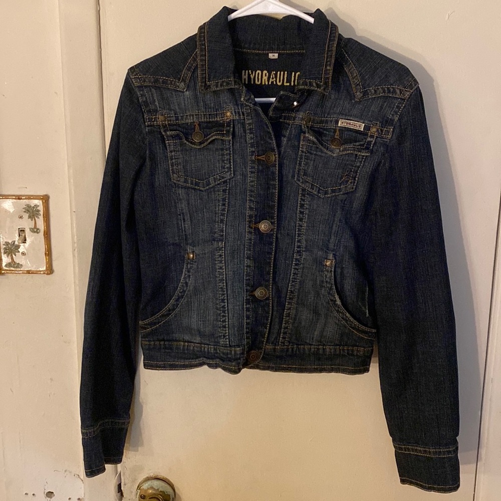 Woman’s dark hydraulic denim jacket